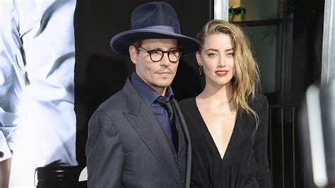 amber heard photos leaked|Amber Heard's topless photo sent to Johnny Depp leaked.